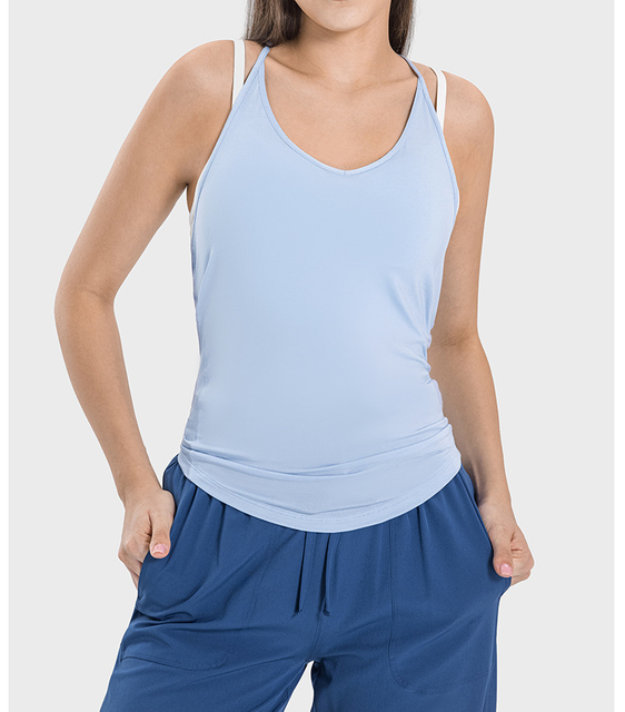 Le nouveau gilet sportif à séchage rapide de la femme et doux avec une beauté Swing Back Swing Yoga Top Solid Pattern pour les adultes
