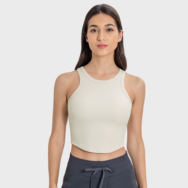 La femme antibactérienne de sueur sans sueur blanche sans manches femme fitness sport yoga débardeur